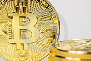 Photo Of Golden Bitcoin virtual currency coin.