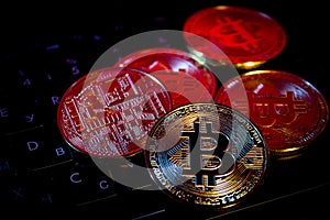 Photo Golden Bitcoins new virtual money Close-up on a keybord.