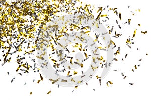 Photo of golden confetti on a white background.