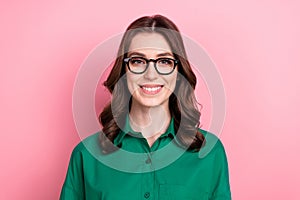 Photo of gorgeous clever cute friendly woman with wavy hairdo dressed green shirt glasses toothy smiling isolated on