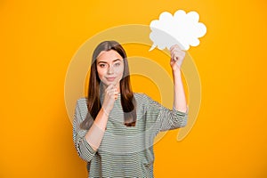 Photo of guessing broody woman holding empty white cloud in wait of when you fill it out while isolated with yellow