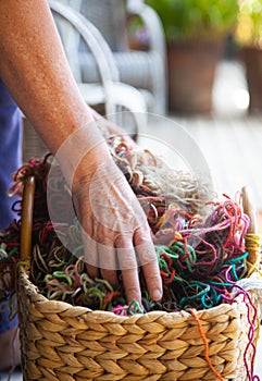 Rustic basket filled with colored wools