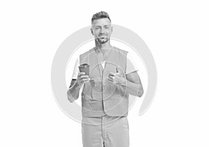 photo of happy man worker wearing reflective vest. man worker with coffee isolated on white.