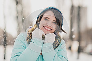 Photo of happy nice pretty lady good mood wear hat scarf weekend winger season snow outside outdoors