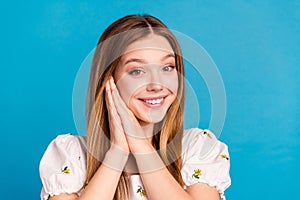 Photo of happy positive girl hands near face look in camera isolated blue color background