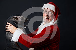 Photo of happy Santa Claus in eyeglasses looking at camera