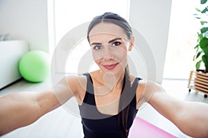 Photo of happy smiling good mood lovely girl sportswoman taking selfie after exercising training at home house