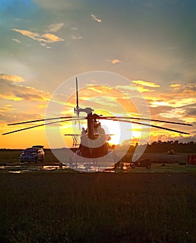 Photo of helicopter maintenance by mechanic at Nop Goliat airport, Dekai Yahukimo, Papua. 17 june 2022.