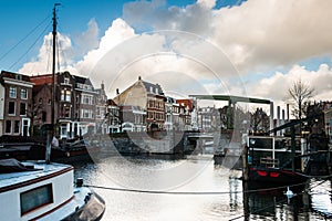 Photo of the historic Delfshaven with beautiful colored clouds in Rotterdam