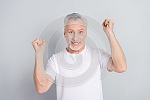 Photo of hooray aged man yell wear white t-shirt isolated on grey color background