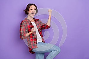 Photo of hooray millennial bob hairdo lady yell hands fists wear plaid shirt  on purple color background