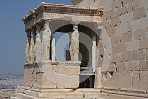 Photo of iconic Erechtheion with famous Caryatids, Acropolis hill, Athens historic center, Attica, Greece