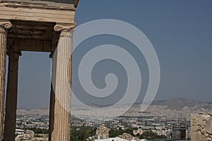 Photo of iconic Erechtheion with famous Caryatids, Acropolis hill, Athens historic center, Attica, Greece