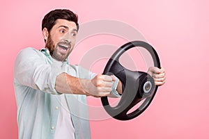 Photo of impressed crazy guy hold volkswagen steering wheel fast speed high sensitivity bad road surface  on