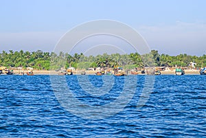 Photo of Industrial fishing boat. Fishing boat in sea. The fishing industry in India. Indian traditional fishing boat.