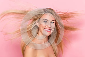 Photo of joyful lady have her hairstyle hairdo fly new anti dander shampoo aplly concept  over pink pastel color