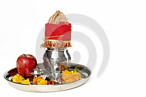 Photo of kalash with coconut and pooja thali with apple for navratri festival