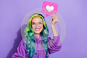 Photo of lady with vivid haircut hold heart paper over head repost comments wear pullover isolated violet color