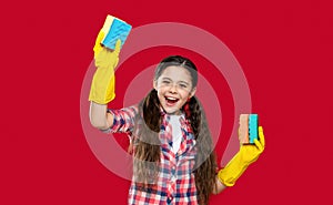 photo of laughing girl housecleaner do chores with sponge. girl housecleaner do chores
