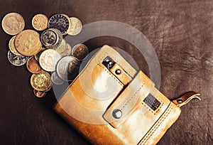 Photo of leather wallet with coins