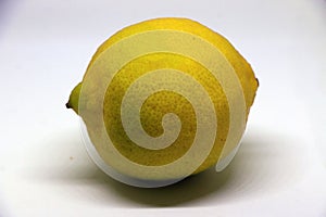Photo of a lemon  over a white background photo