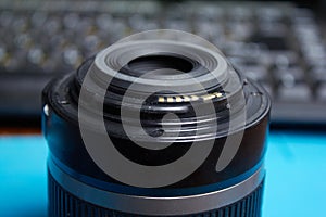 Photo lens with electrical contacts closeup shot