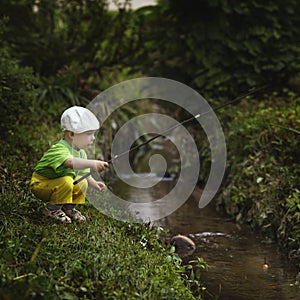 Photo of little boy fishing