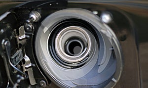 Close-up POV shot of a car gas tank opening