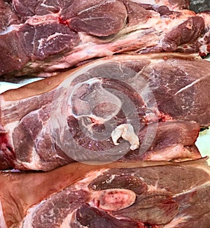 Photo a lot of pork meat on the supermarket shelves