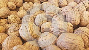 Lots of inshell walnuts texture