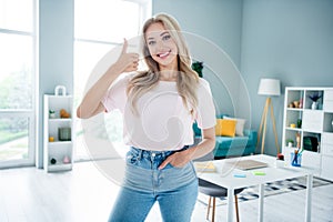 Photo of lovely adorable girl realtor showing thumb up demonstrate nice modern comfort room house home