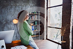 Photo of lovely successful woman office crossed arms working in modern office looking window workspace