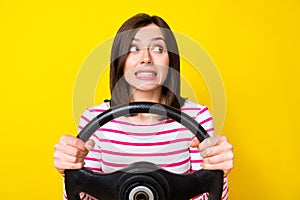 Photo of lovely young woman hold steering wheel failed driving lesson test dressed trendy striped look isolated on