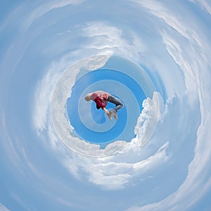 Photo manipulation with spherical panorama of a man free falling