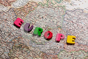 Photo of map of european countries and colorful letters on the w