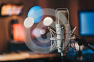 Photo Microphone in recording studio with bokeh background, close up shot