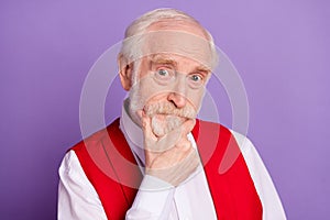 Photo of minded thoughtful old man hold hand chin minded think plan isolated on purple color background