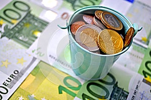 Photo of money, paper bills lying on the table. Bright image of money, euros in sunlight. photo