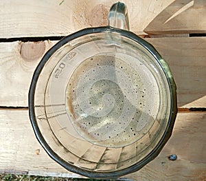 photo of a mug of dark beer