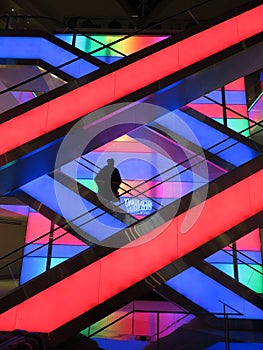 Pretty Multicolored Escalators at a Shopping Mall