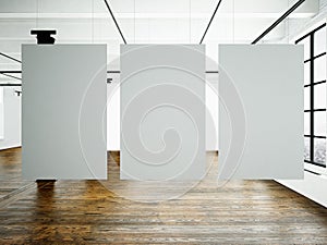 Photo museum interior in modern building.Open space studio. Empty white canvas hanging.Wood floor, bricks wall,panoramic photo