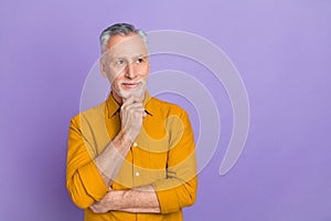 Photo of nice aged grey hairdo man hands face look promo wear yellow shirt isolated on purple color background