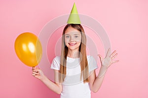 Photo of nice blond small girl show five hold balloon wear hat white t-shirt isolated on pink color background