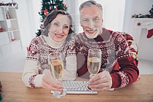 Photo of nice couple aged lady man sit hold glasses wear sweater at home