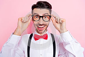 Photo of nice impressed brown hair guy wear spectacles white shirt isolated on pastel pink color background