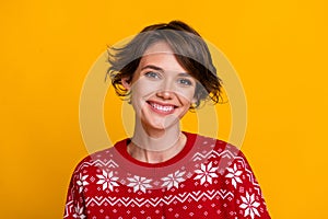 Photo of nice toothy beaming girl with bob hairstyle dressed red sweatshirt smiling at christmas eve isolated on yellow