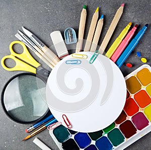 Photo of office and student gear over white background