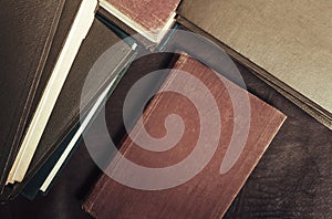 Photo of old antique books laying on table