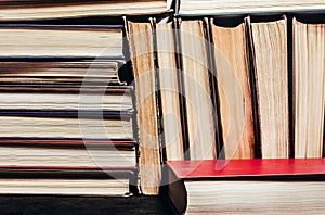 Photo of old antique books stack and row