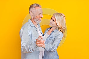 Photo of old cheerful positive people couple dance good mood enjoy harmony love isolated on yellow color background